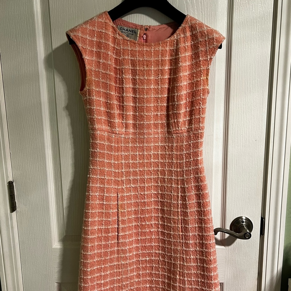 Chanel pink tweed dress with front pocket. Length above knee with lining inside.